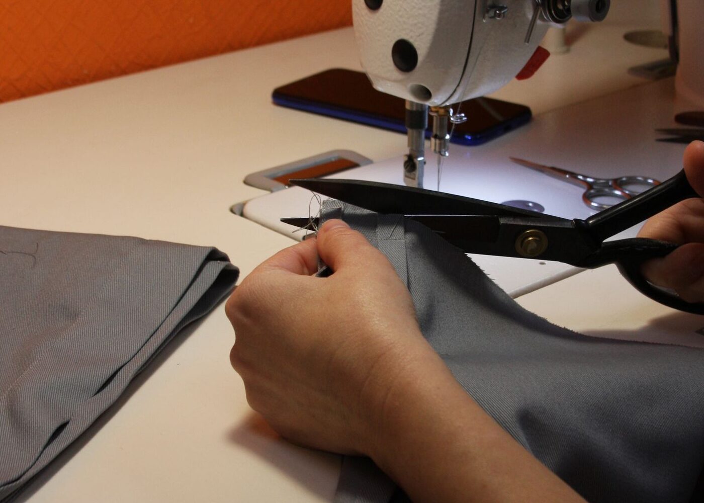 Machinist stitching a garment on our sewing line